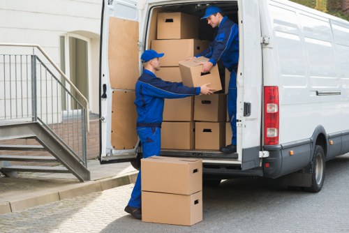 Packed office boxes and labelled equipment for a Barnet commercial move