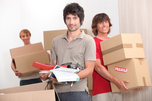 Professional packers preparing household belongings in Barnet