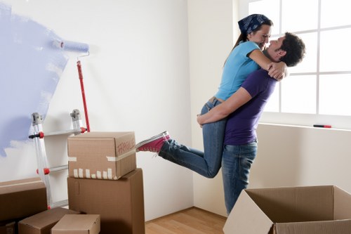Professional movers handling furniture in Barnet