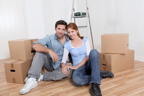 Barnet movers loading furniture and boxes into a removal van