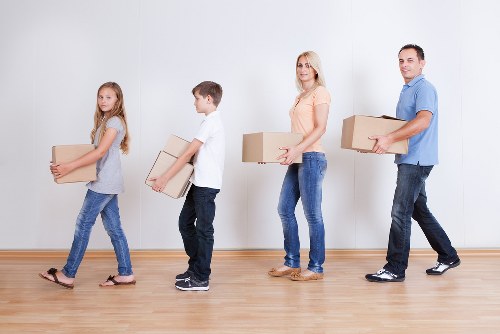 Packed moving boxes in a Barnet apartment